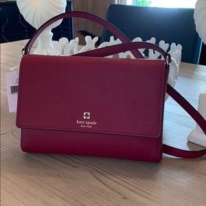 Brand new never been used late spade purse